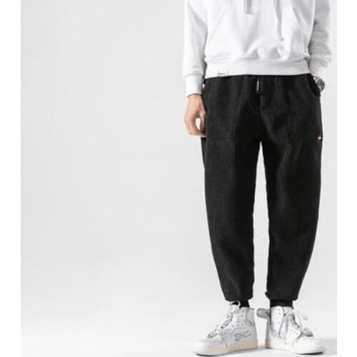 2020 corduroy pants men slim fit European and American style retro small leg loose casual pants mens closing sports pants 2021
