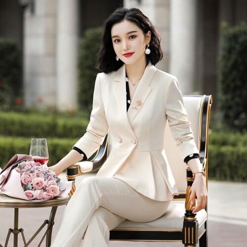 Ladies suit autumn new solid color double-breasted asymmetrical hem western decoration pants suit temperament wild two-piece