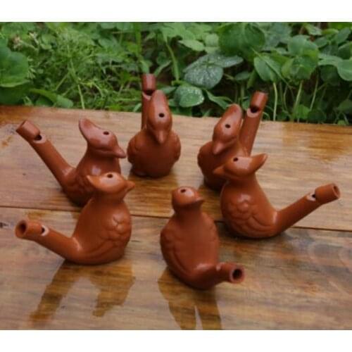 The purple sand water bird whistle can blow to bright sound factory wholesale household crafts sculpture statue