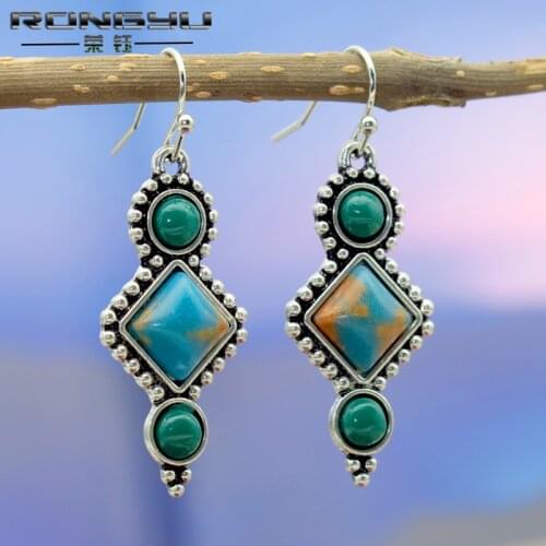 Rongyu new retro Plated Silver Dragon Crystal Turquoise Earrings European and American fashion Jasper Green Diamond Earrings