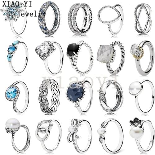 XIAOYI 2020 New 100% S925 Classic geometry zircon blue crystal bow shell snowflake interwoven ring wholesale wedding female
