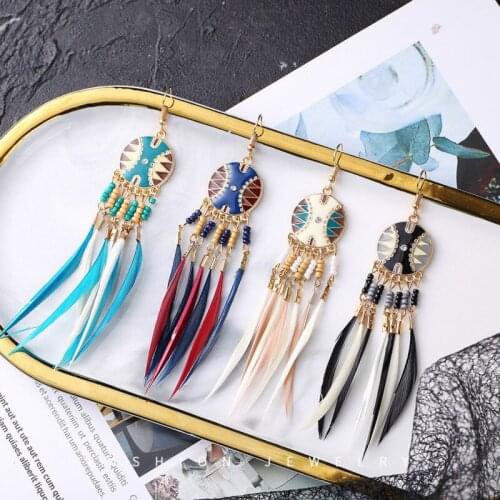 Creative round bohemian style two-tone long feather earrings female rice beads earrings tassel earrings fashion jewelry