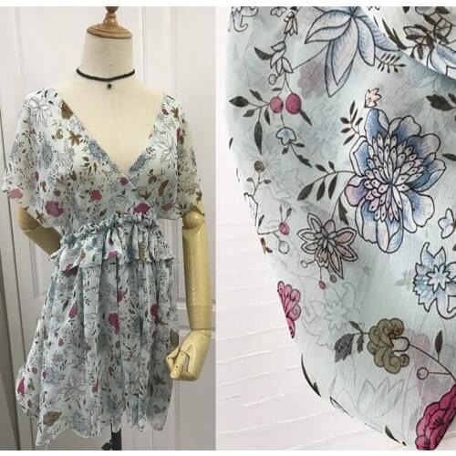 Super beautiful twilight blue summer show small flower with Tibetan blue background silk wrinkled Chiffon cool fabric