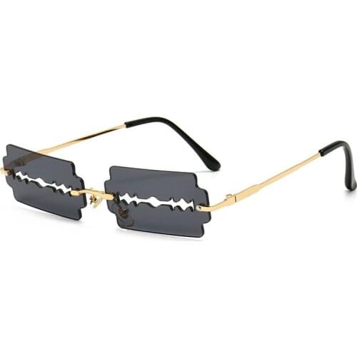 New Frameless Personality Hollow Blade Woman Sunglasses Retro Unique Hollow Funny Sunglasses Party Catwalk Men Sun Glasses