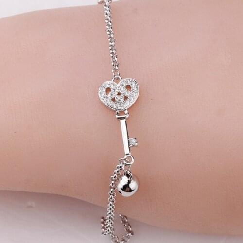 Beatiful Heart-shaped Key and Lovely Bells Bracelet Copper metal Zircon Ztone Chain Bracelet for Women