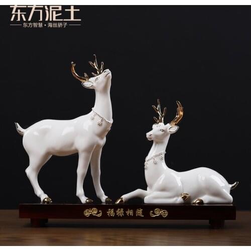 East mud dehua white porcelain sculpture fuels the deer place to live in the living room TV cabinet decoration/blessing