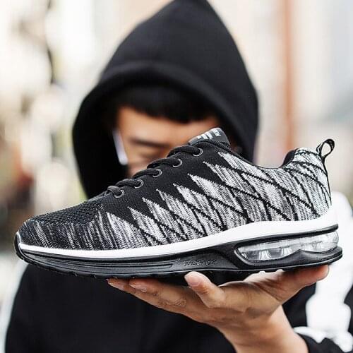 Spring and autumn new flying woven air cushion couple jogging shoes fashion sneakers low cut lace mesh breathable tennis shoes