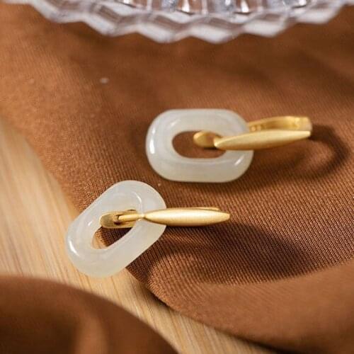 New silver inlaid natural southern red agate face earrings Chinese retro creative irregular shaped womens brand jewelry