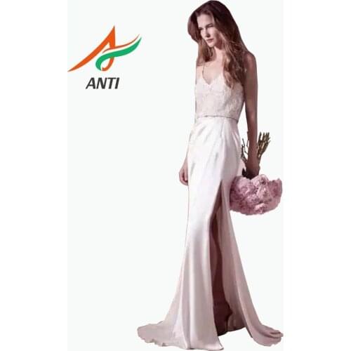 ANTI White Long Evening Dress Satin 2019 Woman Sexy V-Neck Spaghetti Strap Backless Robe De Soiree Pearls Crystal With Bow LM159