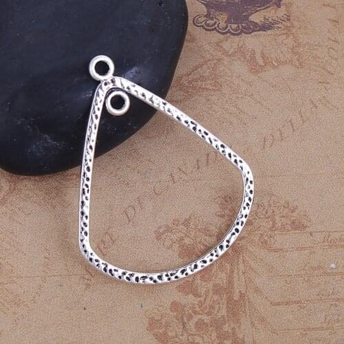 DoreenBeads Zinc Based Alloy silver color Pendants Hollow Drop Pattern DIY Components 39mm(1 4/8") x 31mm(1 2/8"), 50 PCs