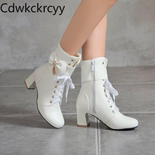 Winter The New fashion British style Round head High heels Martin boots black white Pink sweet Bow High heels Women boots