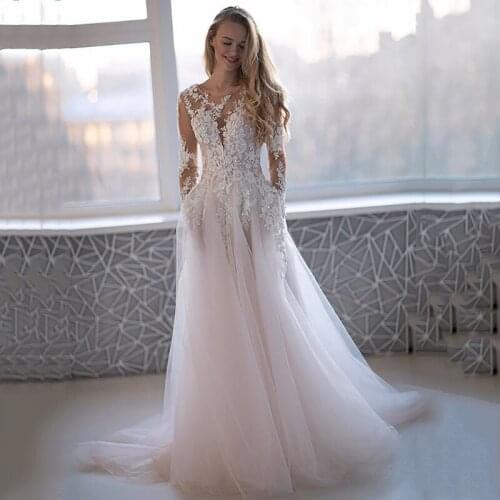 Delicate Light Pink Vintage Wedding Dresses Long Sleeve Lace Bride Dress 2021 Beads Pearls A Line Wedding Gowns Buttons Zipper
