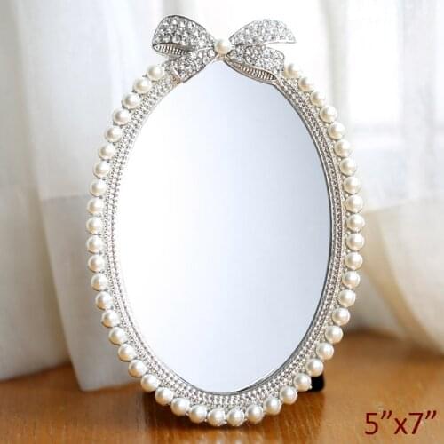 Shiny Silver Plating with White Pearls and Clear Rhinestones Jeweled Ribbon Design 5x7 inches Oval Metal Framed Tabletop Mirror