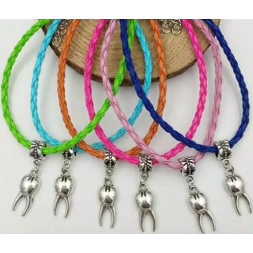 20 Pcs / Lot Fast shipping Tooth Dangle Bead Pendant Mixed Color Leather Braided Rope Bracelets&Bangles Womens Jewelry
