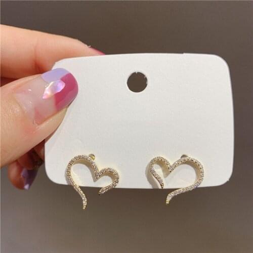 New wild simple earrings female Korean temperament heart-shaped hollow girl small earrings earrings