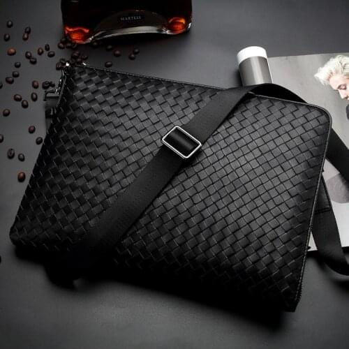 Wholesale leather mens bag casual fashion trend mens Korean version of weaving hand bag large-capacity sheepskin bag tide