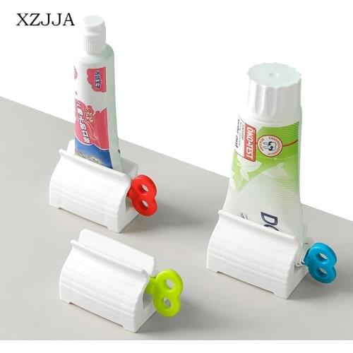 XZJJA Multi-function Toothpaste Squeezers Rolling Tube Squeezer Creative Bathroom Tooth Paste Dispenser Bathroom Accessories