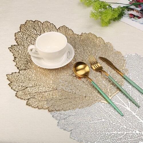 Simple solid color PVC leaf shape hollow decorative mat thermal insulation non-slip dining table creative western placemat