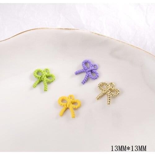 Wholesale 100pcs/lot 13mm Spray paint cartoon bow shape alloy floating locket charms diy jewelry earring pendant accessory