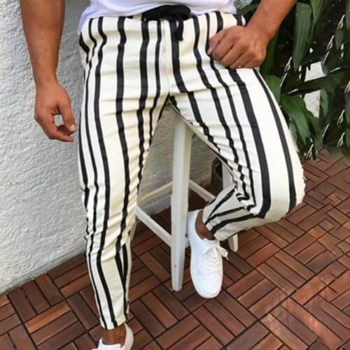 Casual Men pants Sports Pants 2021 Fashion Men Vertical Stripes Print Elastic Waistband Pockets Long Skinny 3XL Pants Hot Sale