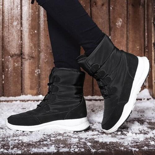 2020 snow boots womens cold-resistant thickened leather integrated waterproof non-slip large size middle tube cotton shoes