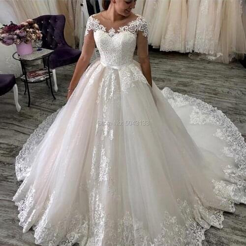 Romantic Custom Short Sleeves Lace Appliques Wedding Dresses 2020 with Sash Sweep Train O-Neck Tulle Wedding Bridal Gowns