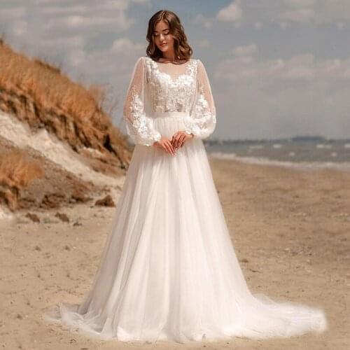 Hot Sale Charming Lace Wedding Dresses Long Sleeves Wedding Gowns Bateau Neckline Appliqued 2021 Bridal Dresses Illusion Back