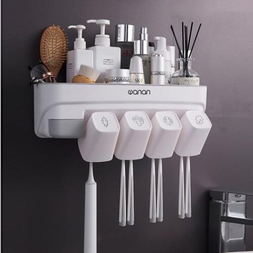 New Magnetic Toothbrush Holder With 2/3/4Cup Toothpaste Dispenser Wall Toilet Makeup Storage Rack For Bathroom Accessories