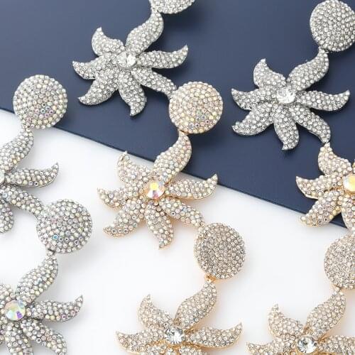 Pauli Manfi 2021 Fashion Metal Rhinestone Flower Earrings Womens Creative Popular Dangle Earrings Party Accessories