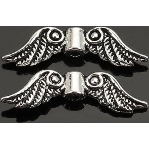 DoreenBeads Retail 50 Silver Color Angel Wing Charm Spacers Beads 23x7mm