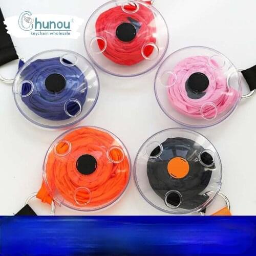 Creative Portable Retractable Storage Bag Keychain Foldable Rotating Environmental Protection Shopping Bag Keychain Wholesale
