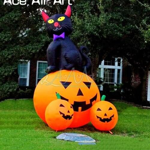 Creative combination yard decoration inflatable pumpkin with black cat on top,scary decor for lawn