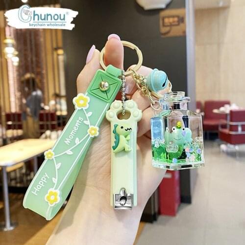 Cartoon Drifting Bottle Keychain Animal Floating Milk Bottle Charm Key chain Womens Nail Clippers Car Bag Keychain Accessories