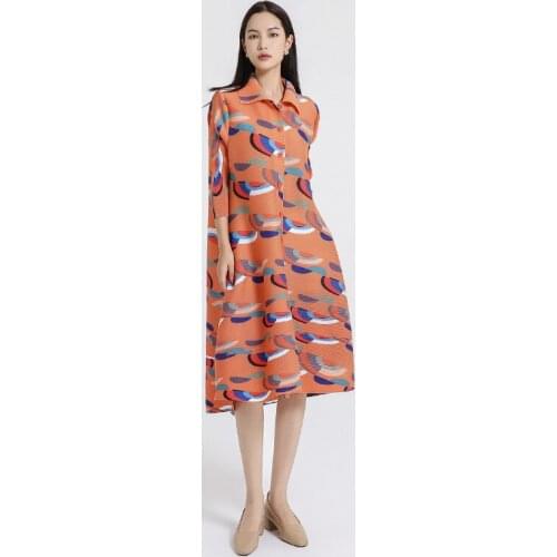 2021 autumn new womens breasted dress Miyak fold Large size loose all-match printed windbreaker mid-length dress