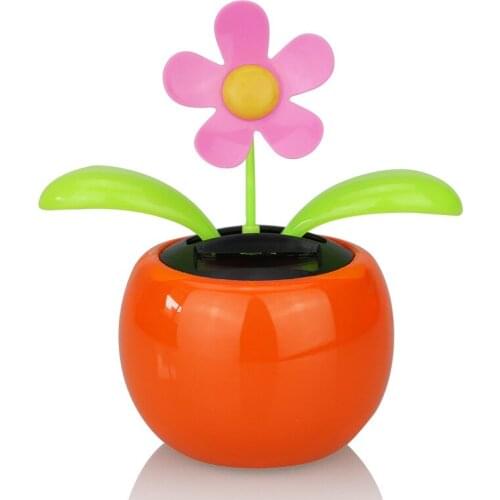 The sun floats in car decoration accessories and lovely small jewelry ornaments swing head