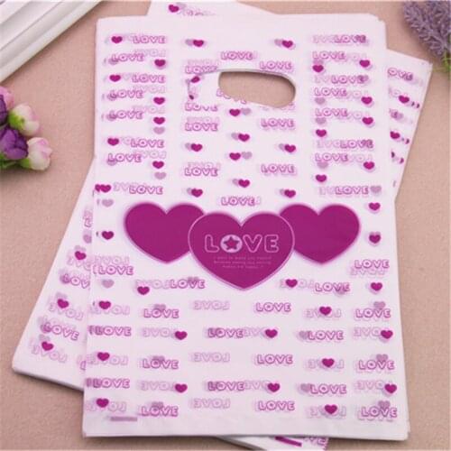 2017 Wholesale 100pcs/lot 20*30cm Fashion Love Sweet Heart Gift Bags With Handles Plastic Wedding Gift Packaging Bags
