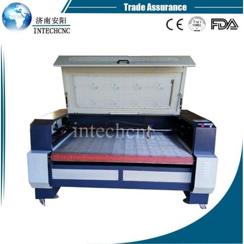 CE approval 1610 auto feeding laser cut machine for wedding invitations/co2 laser cutting machine price