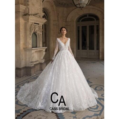 Luxurious wedding dresses deep v neck illusion low back full sleeves long lace sequins beadings bridal gowns with bling 2021