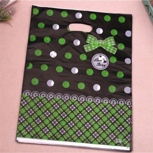 New Design Hot Sale Wholesale 100pcs/lot 30*40cm Christmas Package Bags Luxury Plastic Gift Packaging Bags For Wedding