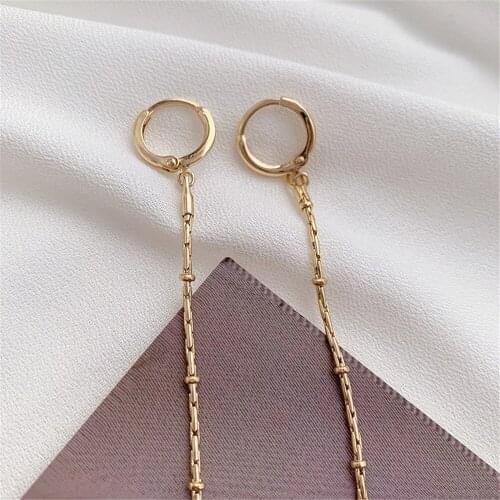 Korean Temperament Long Style Net Red Earrings Cold Wind Tassel Ear Buckle Niche Chic S Female Face Look Thin 2021 New
