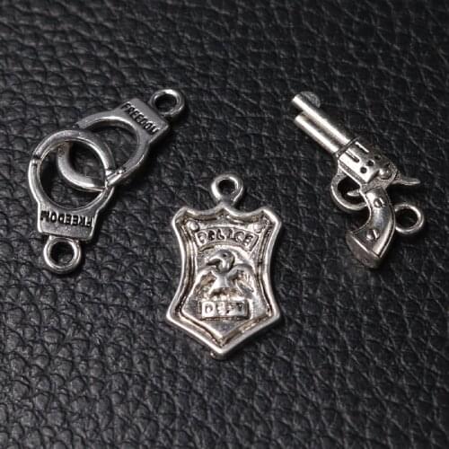 18pcs Mix Silver Plated Police Badge Pistol Handcuffs Pendant DIY Charm Retro Bracelet Keychain Metal Jewelry Carfts Accessories