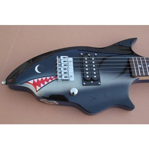 Free shipping custom 6 string blue guitar,irregular shark guitar,fixed bridge,H pickups,rosewood frets pearl fish inlay