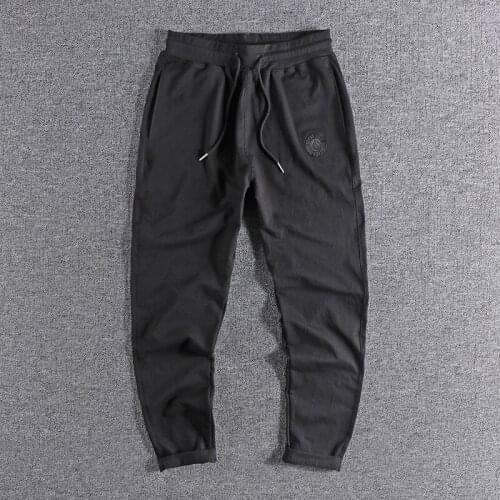 2021 new Solid color thin embroidered sports pants mens American fashion four seasons loose legged youth leisure pants 131