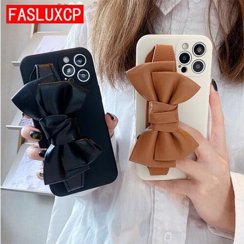 Luxury Leather Bow Wristband Phone Holder Case for iPhone 13 12 Pro Max Mini 11 SE 2020 6S 7 8 Plus X XR XS Silicone Back Cover