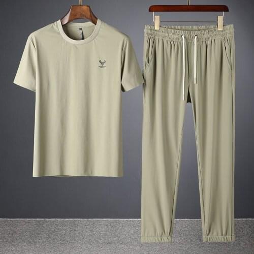 2021 summer ultra thin silk sliding fast drying high end two piece ice silk breathable short sleeve mens casual sports suit