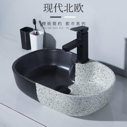 Nordic minimalist desk basin light luxury splash-proof balcony washbasin household desk washbasin oval art basin