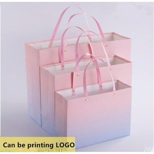 100PCS/LOT High Grade New Style Paper Bag Rivet Handle Gift Packaging Bag Shopping Bag Can Customized Size