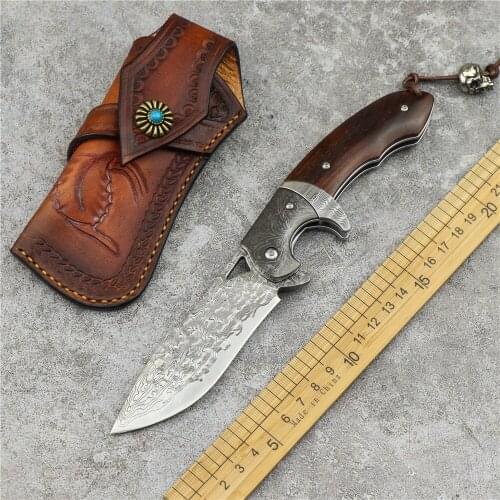 The Damascus steel the hunting knife the survival knife the camping knife