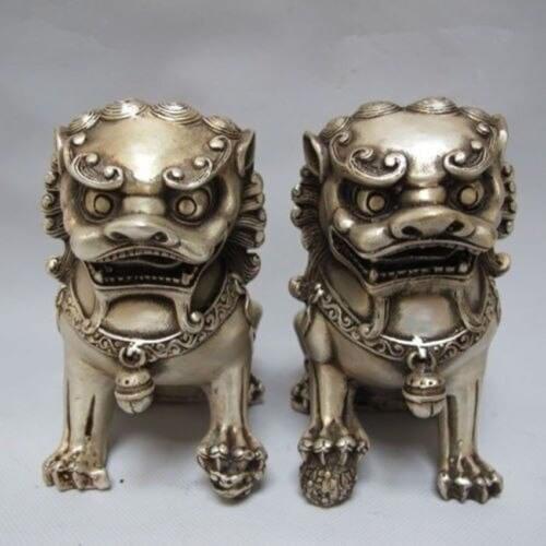A Pair of Chinese Tibetan Silver guard Foo Dogs Lion statues