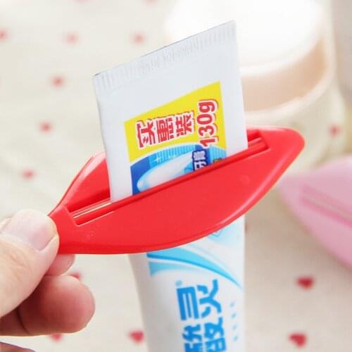 1Pcs Sexy Hot Lip Kiss Bathroom Tube Toothpaste Dispenser Cream Tube Rolling Holder Squeezers Toothpaste Squeezed Out